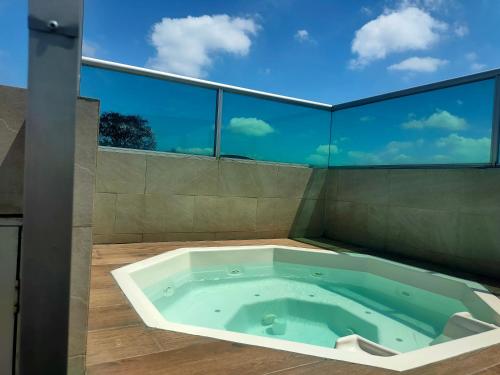 a jacuzzi tub on the roof of a house at 2 room department (5 people). Private exclusive area in Guayaquil in Guayaquil