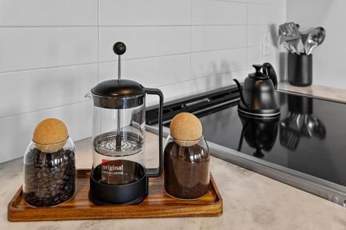 A kitchen or kitchenette at River View, Balcony, Germantown, Central, Elevator