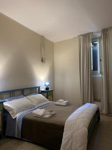 Krevet ili kreveti u jedinici u objektu Casa nel vicoletto