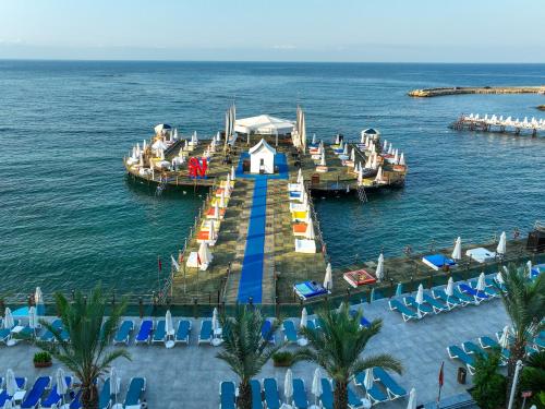 an aerial view of a dock in the water at Orange County Alanya - Family Concept in Alanya