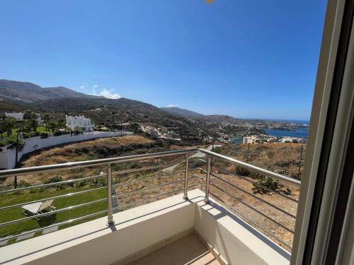 a balcony with a view of the ocean at Creta Vivere Villas in Agia Pelagia