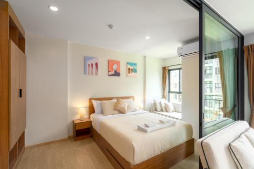 Postel nebo postele na pokoji v ubytování Lacasita Luxury ( 619 ) Near Huahin Beach