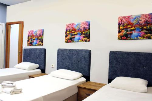Ένα ή περισσότερα κρεβάτια σε δωμάτιο στο biglife hotel