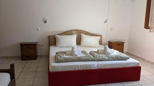 Ένα ή περισσότερα κρεβάτια σε δωμάτιο στο 4 Seasons Villas 2