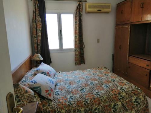 Cama o camas de una habitación en Chalet at Tulip ain el sokhna for rent