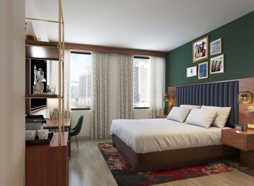 מיטה או מיטות בחדר ב-Hotel Ardent Dayton Downtown, Tapestry Collection By Hilton