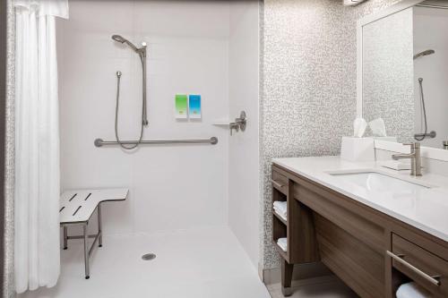 a bathroom with a sink and a shower at Home2 Suites By Hilton Valdosta, Ga in Valdosta