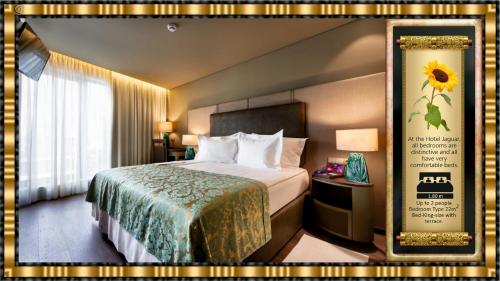 a hotel room with a large bed and a window at Hotel Jaguar Oporto - Airport to Hotel and City Center and Vice-Versa is a Free and Continuous Shuttle Service from 7AM to 8PM in Porto