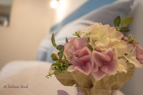 a bouquet of flowers in an ice cream cone at L'Approdo Dell'Ammiraglio in La Spezia