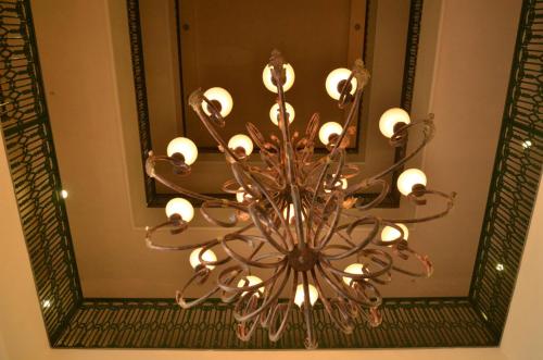 a chandelier hanging in front of a mirror at Hampton Inn Tampico Zona Dorada in Tampico