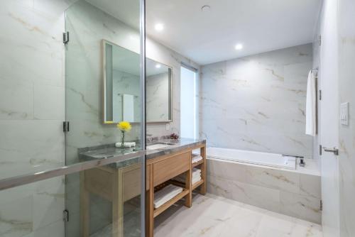  Koi Resort Saint Kitts, Curio Collection by Hilton -  Room  picture :   Tea/Coffee maker    Shower    Safety deposit box                           