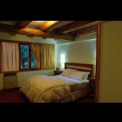 Posteľ alebo postele v izbe v ubytovaní SHALOM