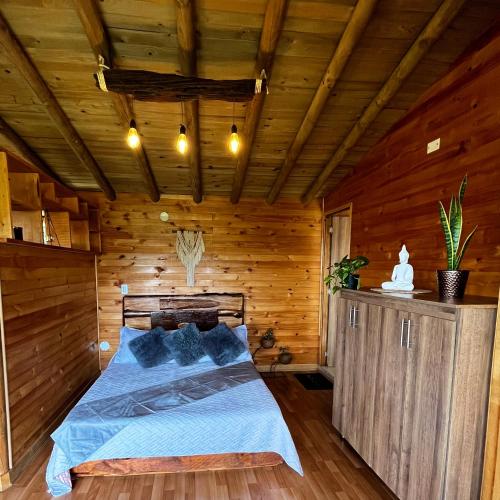 Voodi või voodid majutusasutuse Monte Santa Elena toas