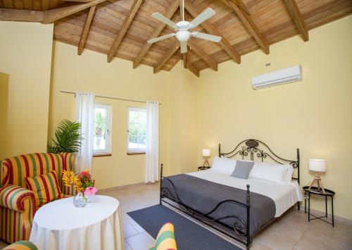 Ένα ή περισσότερα κρεβάτια σε δωμάτιο στο Exclusive Villa at Hideaway Beach