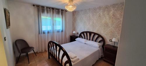 Posteľ alebo postele v izbe v ubytovaní Casa Ferbi