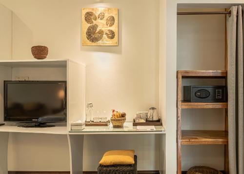 Kuchyň nebo kuchyňský kout v ubytování Pavillon d'Orient Boutique Hotel