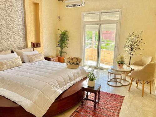 Postel nebo postele na pokoji v ubytování Appartement Marrakech avec piscine privée