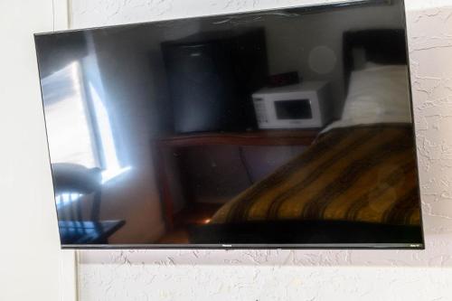 Postel nebo postele na pokoji v ubytování Cypress Fairway Village