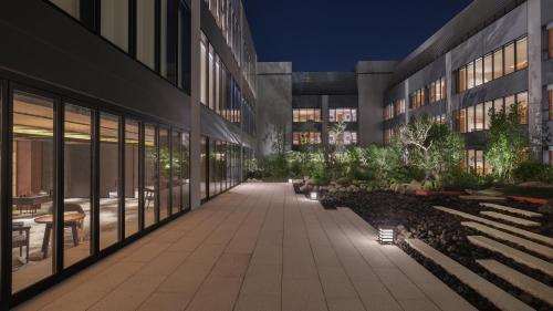 an external view of a building at night at InterContinental Yokohama Pier 8 by IHG in Yokohama