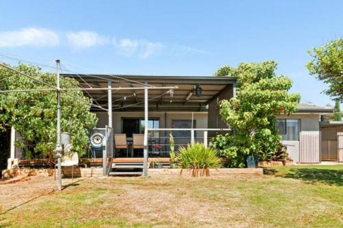 a home with a porch and a patio at Town, Train, Pubs & River all close by in Echuca
