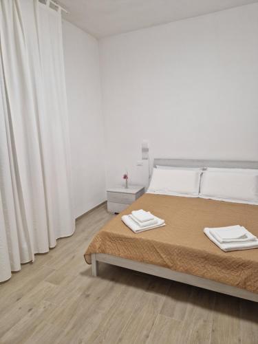 Katil atau katil-katil dalam bilik di Agriturismo Montepinci