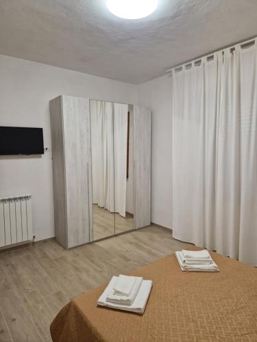 Katil atau katil-katil dalam bilik di Agriturismo Montepinci