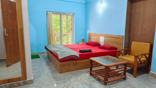Postel nebo postele na pokoji v ubytování AYM Yoga Resort Arambol GOA