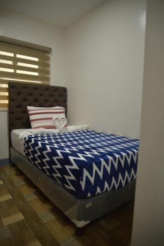 Ein Bett oder Betten in einem Zimmer der Unterkunft FB DORMITEL SUITES
