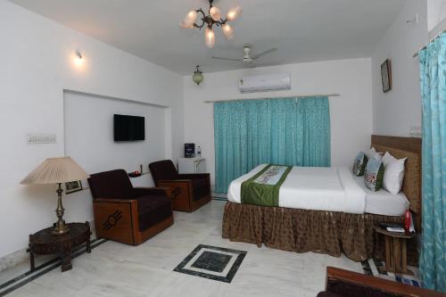 Udaipur şehrindeki OYO Home Home Modern Stay tesisine ait fotoğraf galerisinden bir görsel