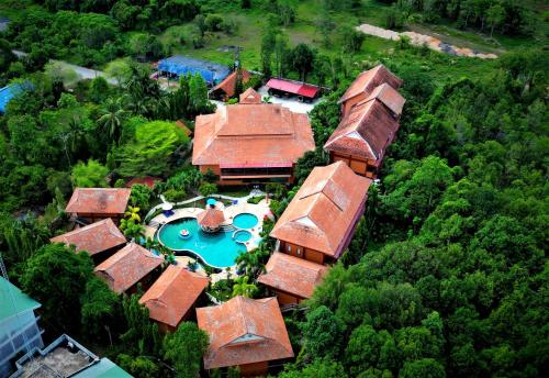 an aerial view of a house with a swimming pool at Andamanee Boutique Resort Aonang Krabi - Free Beach Shuttle - SHA Extra Plus in Ao Nang Beach