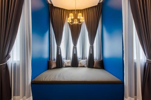 Katil atau katil-katil dalam bilik di The Elements Boutique House