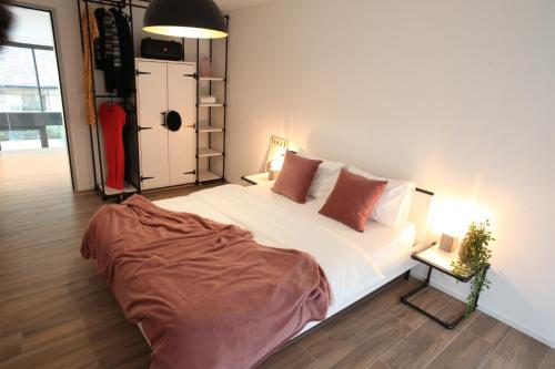 Postel nebo postele na pokoji v ubytování Nest - Lauriedstrasse 7