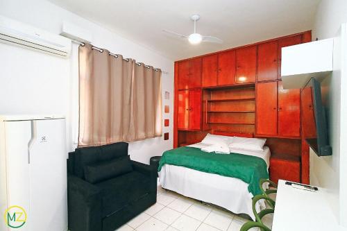 Studio muito pequeno e barato em Copacabana tesisinde bir odada yatak veya yataklar