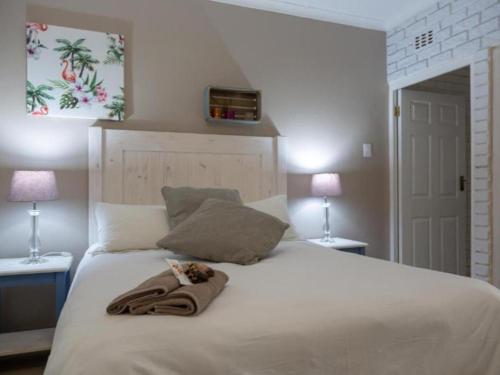 Ένα ή περισσότερα κρεβάτια σε δωμάτιο στο St. Lucia Safari Lodge