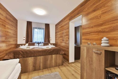 Postel nebo postele na pokoji v ubytování Apartmány Termál