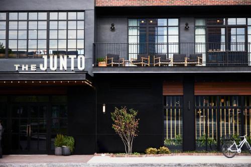 a black building with a jumeirah hotel at The Junto Hotel in Columbus