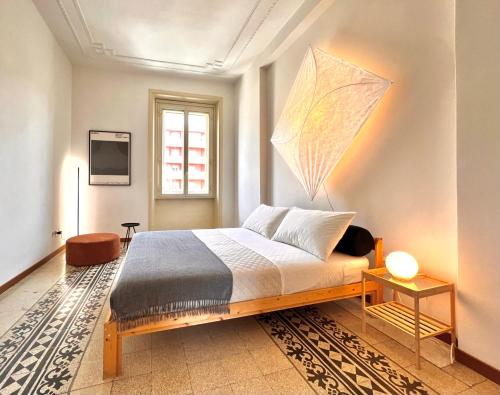 SANT'ANTONIO_roma #hospitality_luxury_design tesisinde bir odada yatak veya yataklar
