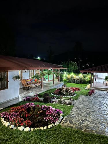 Un jardín fuera de finca Encanto