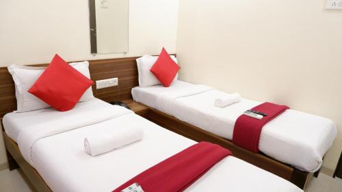 Voodi või voodid majutusasutuse Hotel Briteway toas
