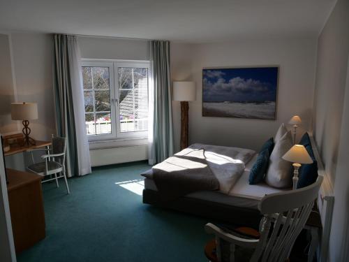 Ένα ή περισσότερα κρεβάτια σε δωμάτιο στο Hotel Bremer