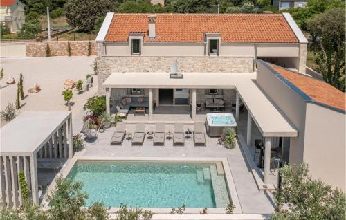 an aerial view of a house with a swimming pool at Villa Utopia in Ugljan
