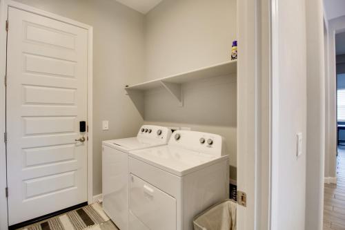 a white laundry room with a washer and dryer at Pet-Friendly Marana Home Community Pool and Hot Tub in Marana