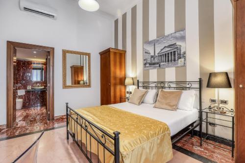 Posteľ alebo postele v izbe v ubytovaní Spagna Dream Suites