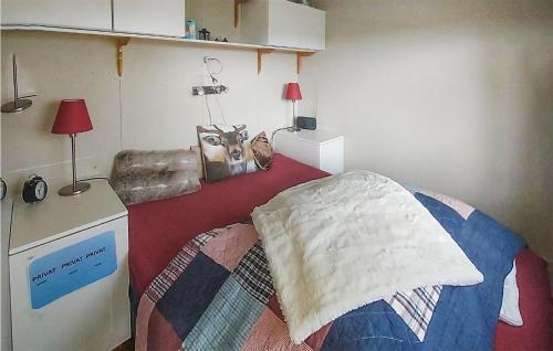 Postel nebo postele na pokoji v ubytování Nice Apartment In Gol With Kitchen