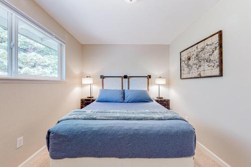 Un pat sau paturi într-o cameră la Rowandale