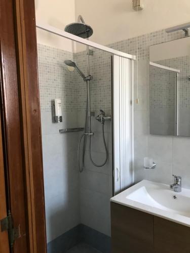 a bathroom with a shower and a sink at Albergo Europa in Marina di Mancaversa