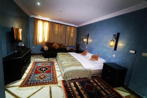 Ein Bett oder Betten in einem Zimmer der Unterkunft Riad Dar Haven