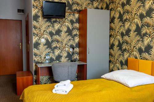 Postel nebo postele na pokoji v ubytování Hotel Everest