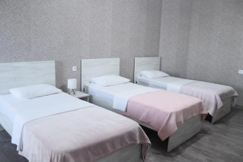 Hotel West Faceにあるベッド