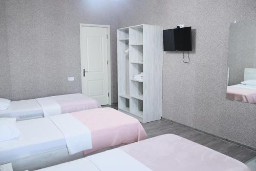 Hotel West Faceにあるベッド